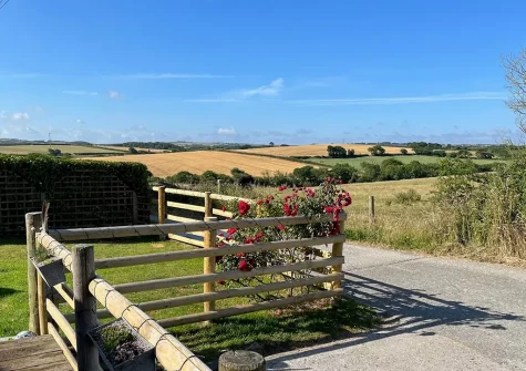 Enjoy stunning countryside views from the front garden when you stay at Woolstone Grenvilles Granary, Box's Shop