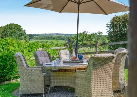 The enclosed garden & alfresco dining area at Woolstone Teagues Trail, Box's Shop