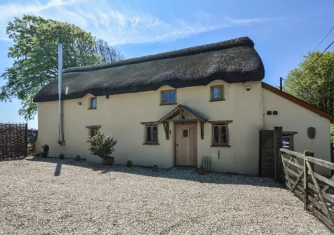 Wrens Thatch is a pretty detached thatched cottage with rivate enclosed garden, patio area & wild flower meadow for walking or exercising dogs