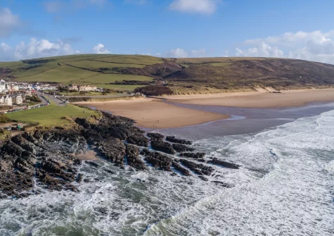 Nearby Woolacombe is known for its five-kilometre stretch of golden sand, popular for surfing & family beach days
