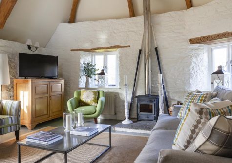 The living room in the stone barn at Yetson House, Yetson